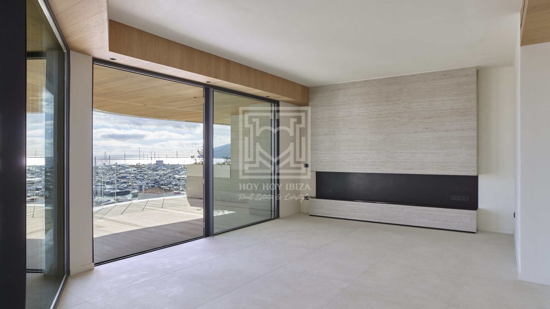 Bright living room with panoramic marina and Mediterranean views in Santa Eulària, Ibiza