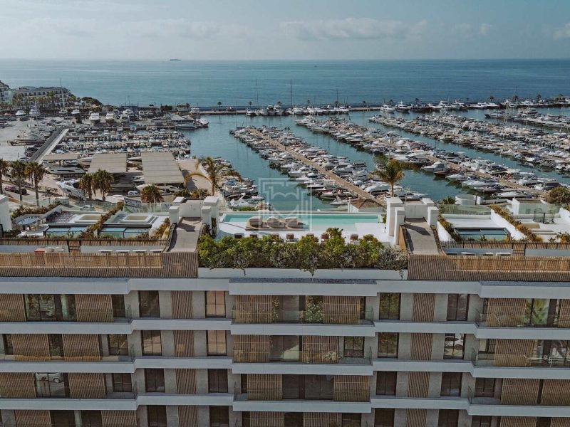 Rooftop residential setting overlooking Santa Eulària marina and the Mediterranean Sea