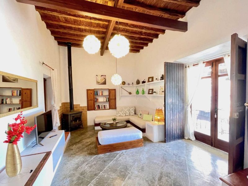 Can pelar san jose main living room fireplace Can Pelar, finca del siglo XVIII de 4 dormitorios en Sant Josep