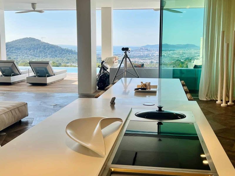 Modern open-plan kitchen with panoramic Ibiza views in Can Furnet
