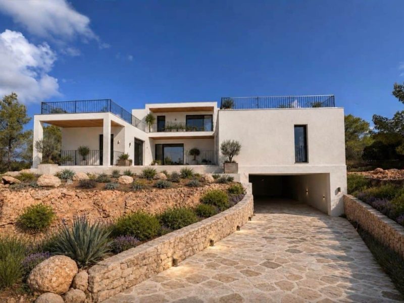 Exterior of villa with private garage in Benimussa, Ibiza