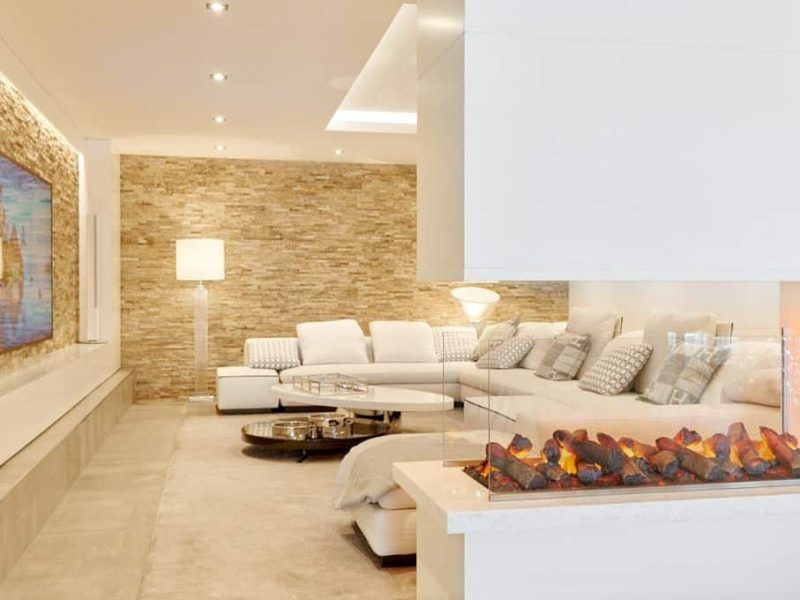 Luxury bedroom with natural stone feature wall in Siesta, Ibiza