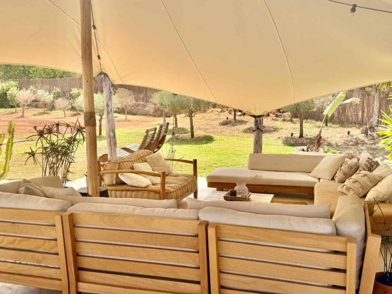 Covered chill-out lounge surrounded by Mediterranean vegetation