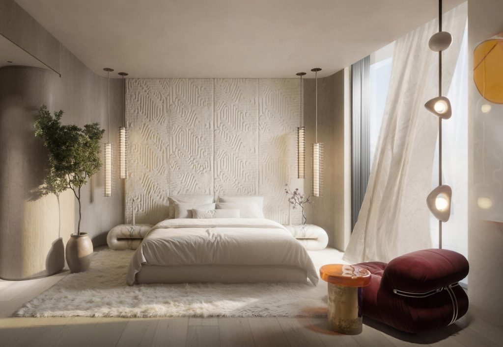 Bedroom of a Casa Pacha apartment in oak and plaster, with sculptural lighting