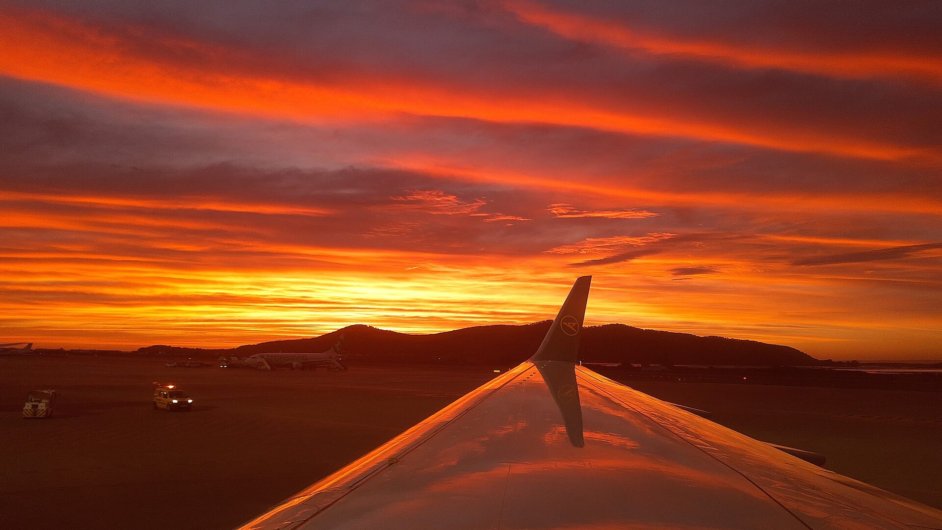 Red evening clouds over Ibiza airport Red evening clouds over Ibiza airport
