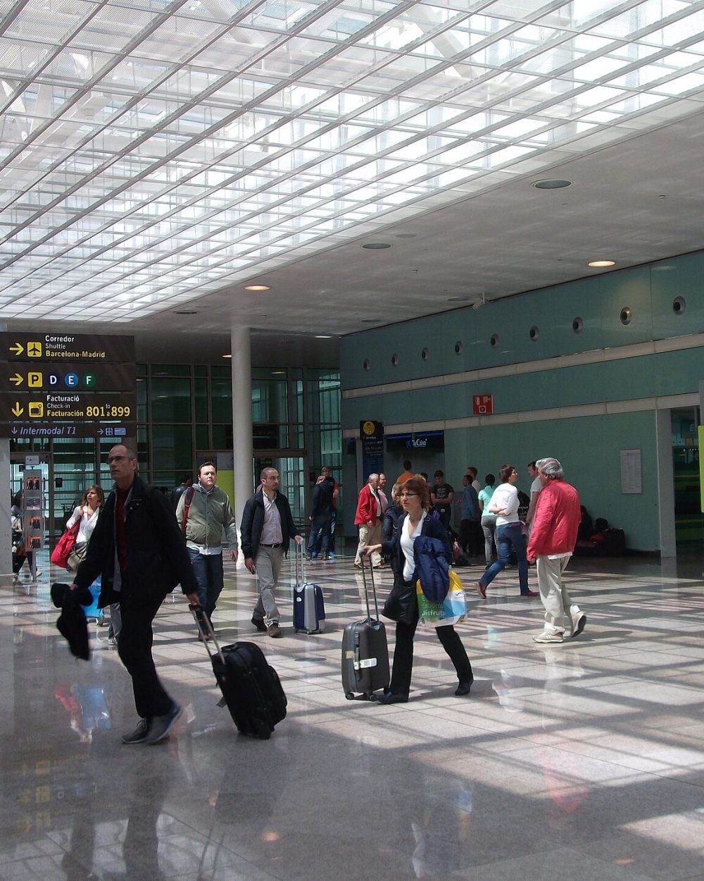 Travellers in Terminal 1 at Barcelona airport Travellers in Terminal 1 at Barcelona airport