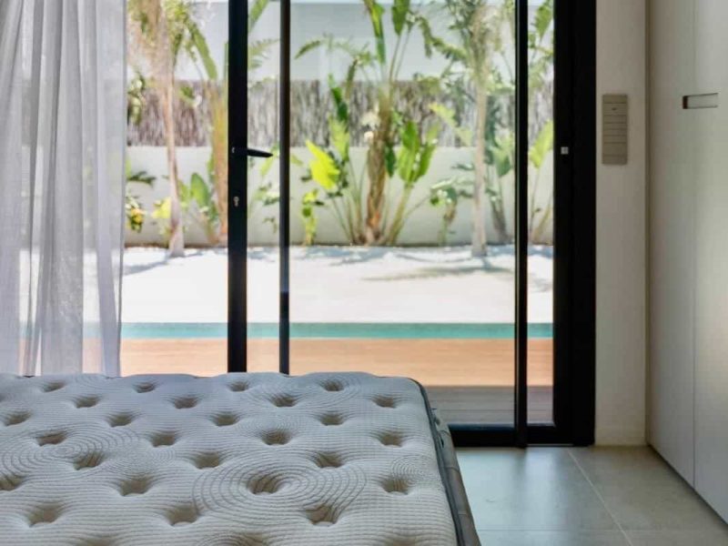 Bedroom with a sliding door onto the pool terrace